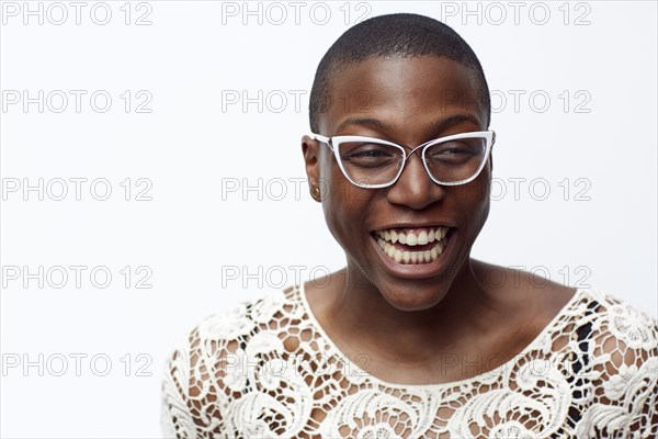 Smiling stylish woman wearing eyeglasses