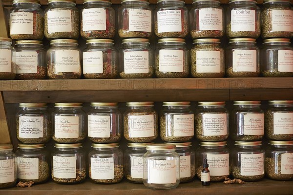 Jars of variety of teas in tea shop