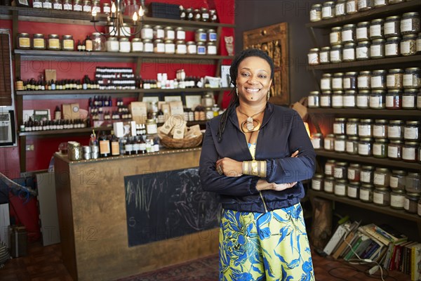 Black woman smiling in tea shop