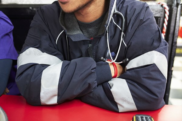 Paramedic sitting in restaurant