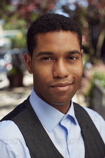 Confident man wearing vest outdoors