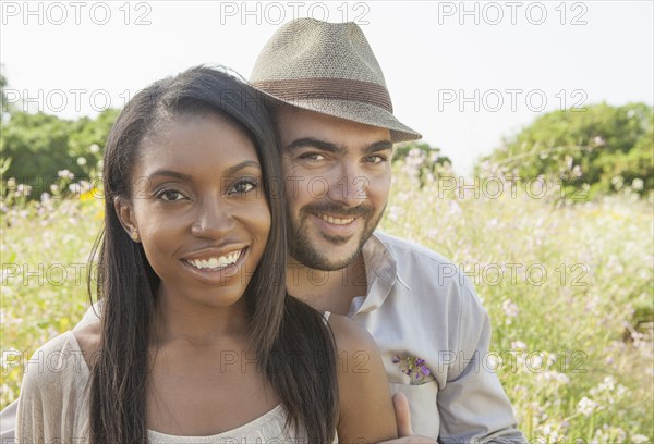 Smiling couple outdoors