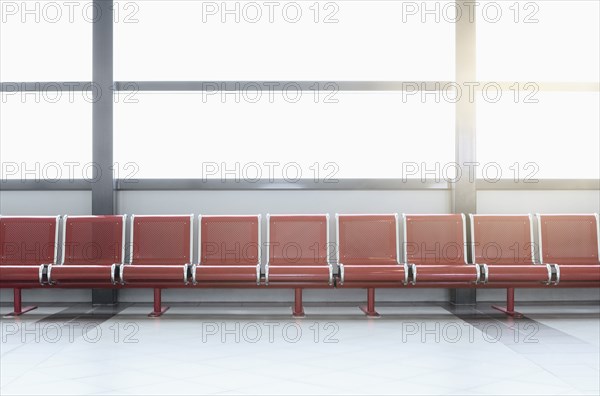 Empty seats in airport lobby