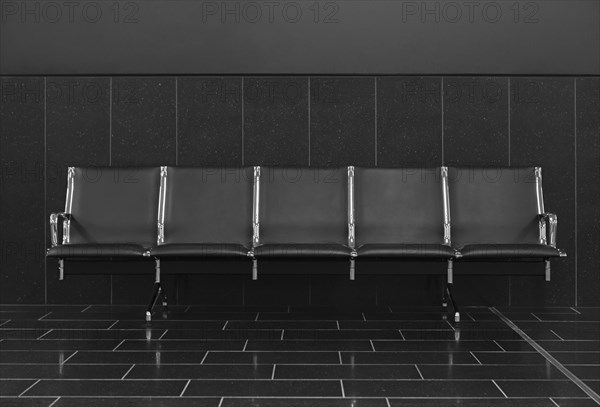 Empty seats in airport lobby