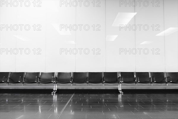 Empty seats in airport lobby