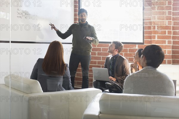 Business people talking in meeting