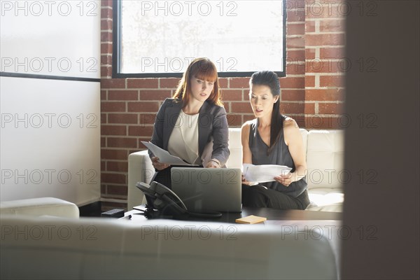 Businesswomen working together in office