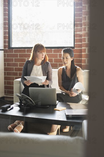 Businesswomen working together in office