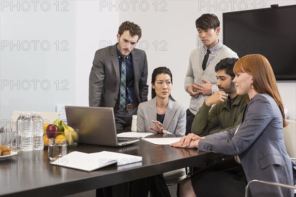 Business people talking in meeting