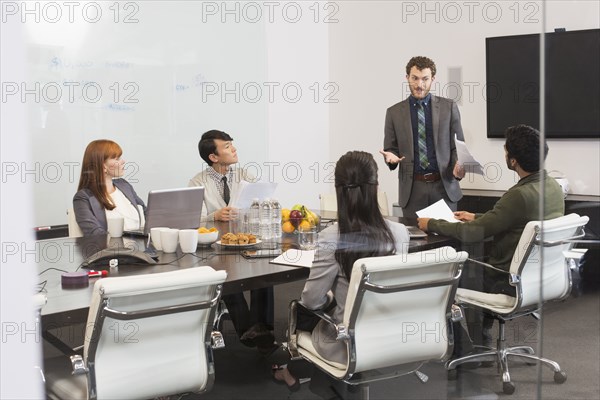 Business people talking in meeting