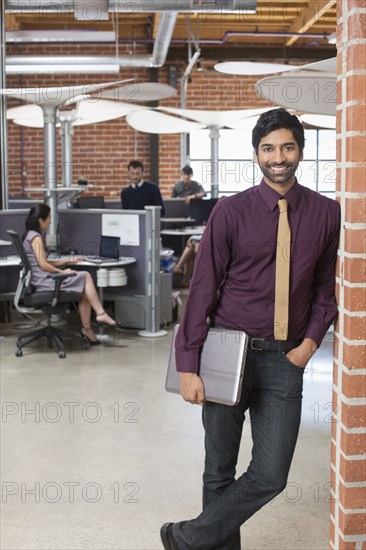 Businessman smiling in office