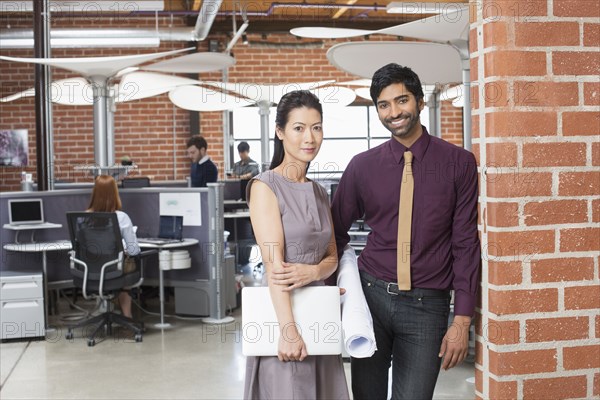 Business people smiling in office