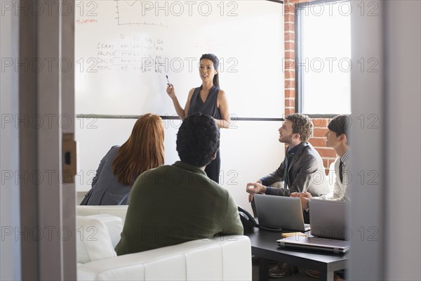 Business people talking in meeting