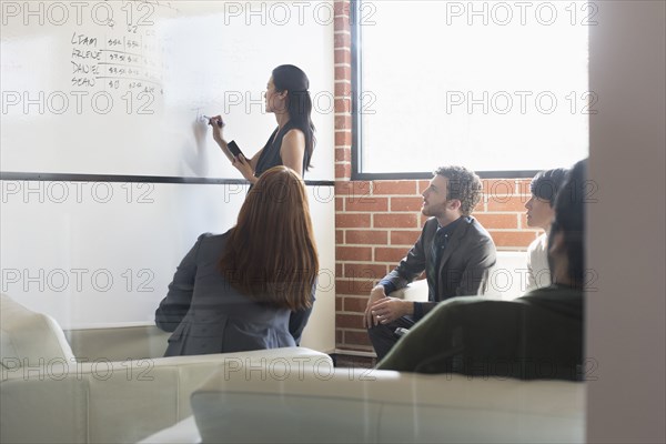 Business people talking in meeting