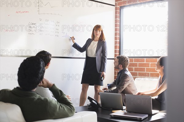 Business people talking in meeting