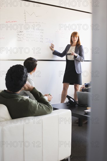 Business people talking in meeting