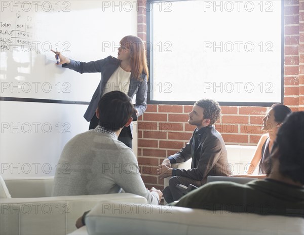 Business people talking in meeting