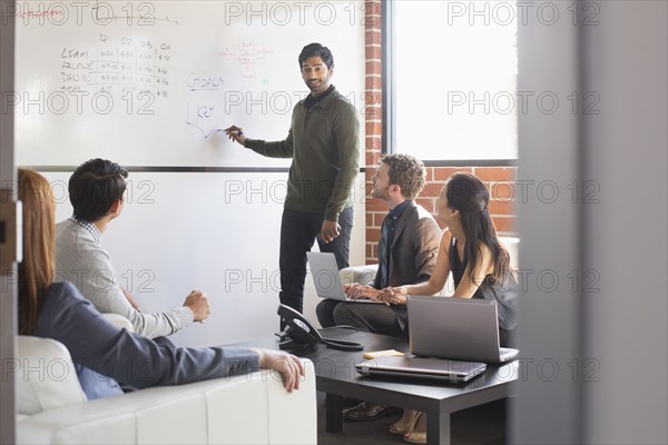 Business people talking in meeting