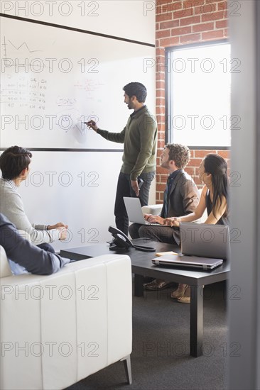 Business people talking in meeting