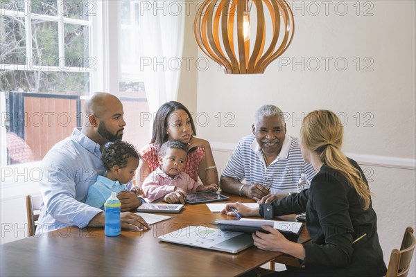 Financial advisor talking to clients