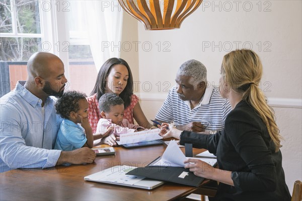 Financial advisor talking to clients