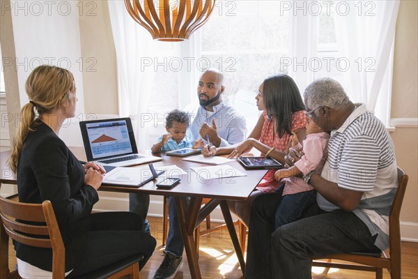 Financial advisor talking to clients