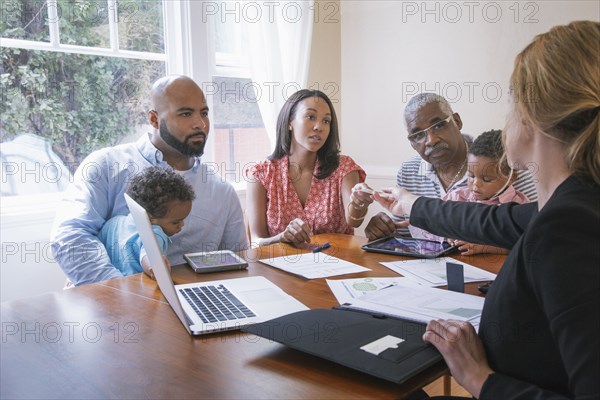 Financial advisor talking to clients