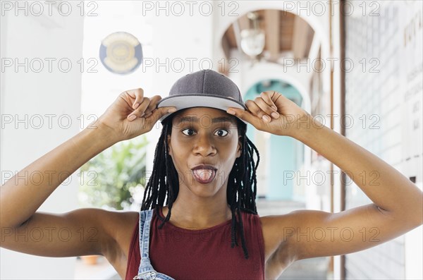 Mixed Race woman making a face