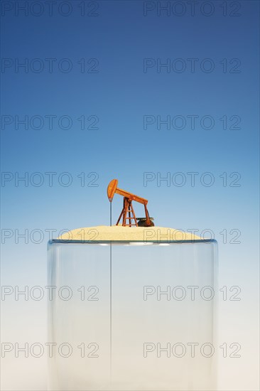 Oil pump on top of empty glass