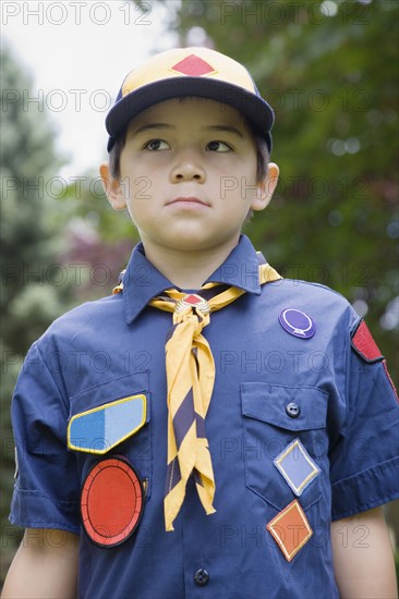 Asian boy wearing uniform