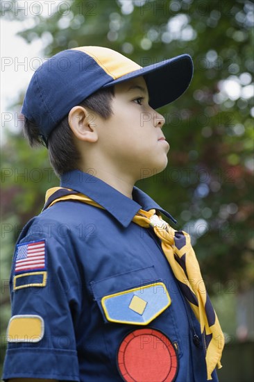 Asian boy wearing uniform