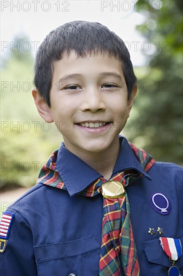 Asian boy wearing uniform