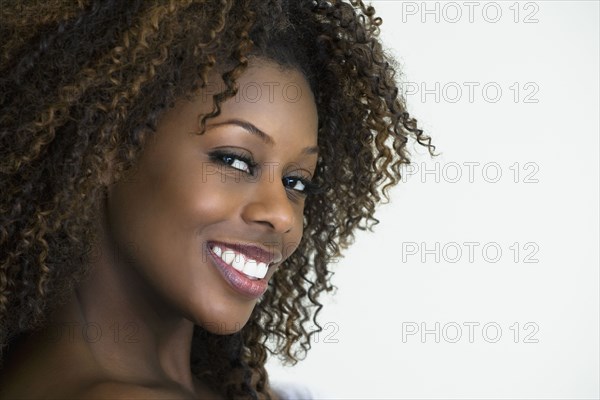 Confident African woman smiling