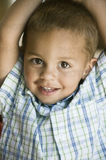 Portrait of smiling mixed race boy