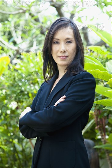 Japanese businesswoman with arms crossed