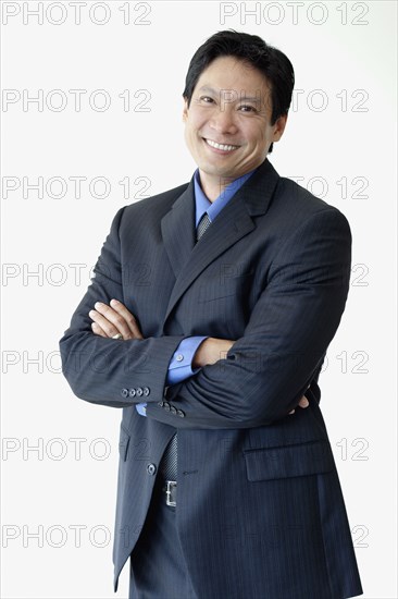 Japanese businessman with arms crossed