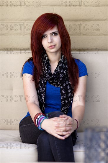 Serious Caucasian redheaded teenager