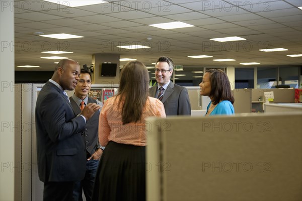 Business people talking together in office