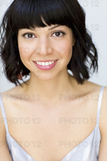 Smiling mixed race woman