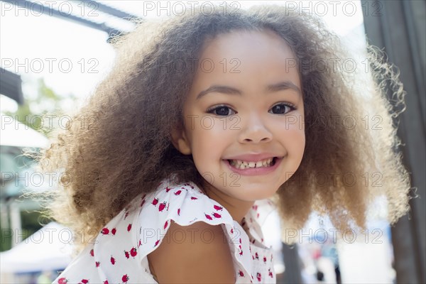 Smiling mixed race girl