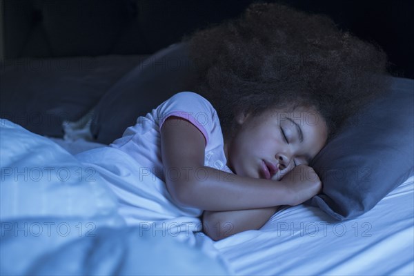 Mixed race girl sleeping