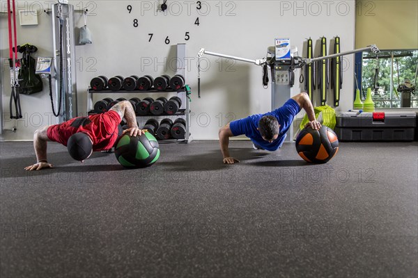 Men working out in gym