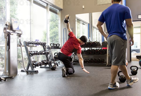 Men working out in gym