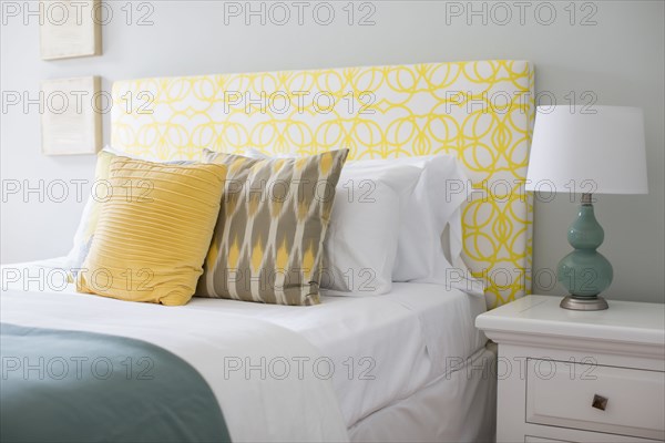 Bed and nightstand in modern bedroom