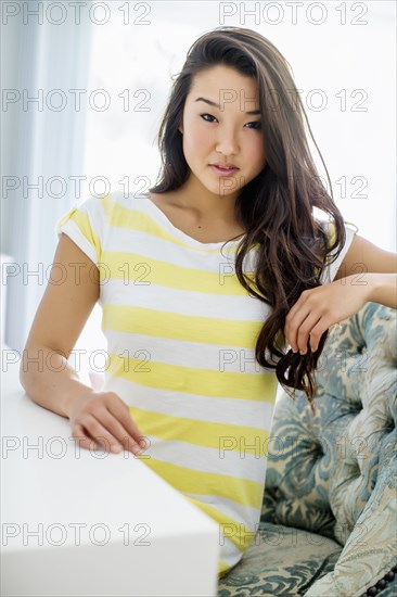 Japanese woman sitting at desk