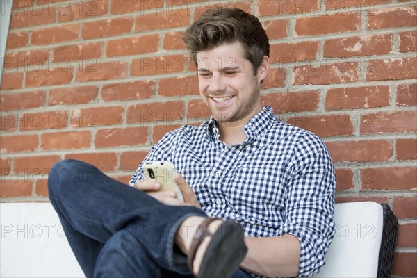 Man using cell phone outdoors