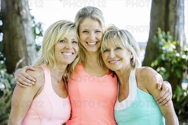 Caucasian women smiling outdoors