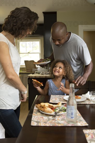 Family eating together at table