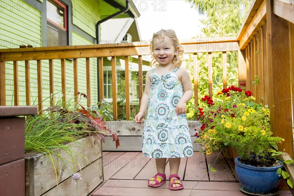 Caucasian girl playing on deck