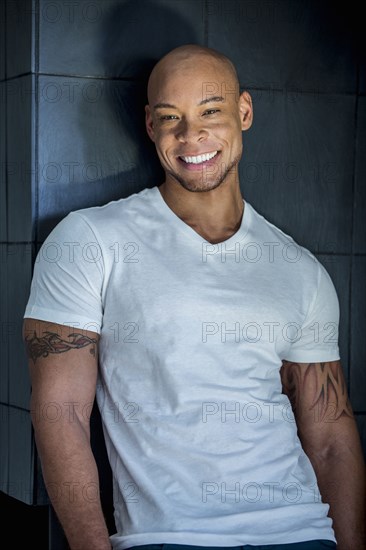 Mixed race man smiling